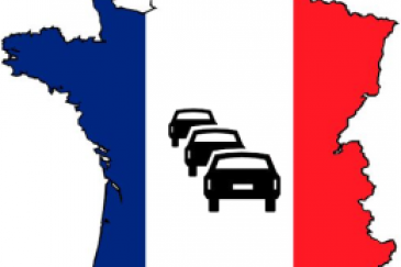 Franse vlag met auto's in de file